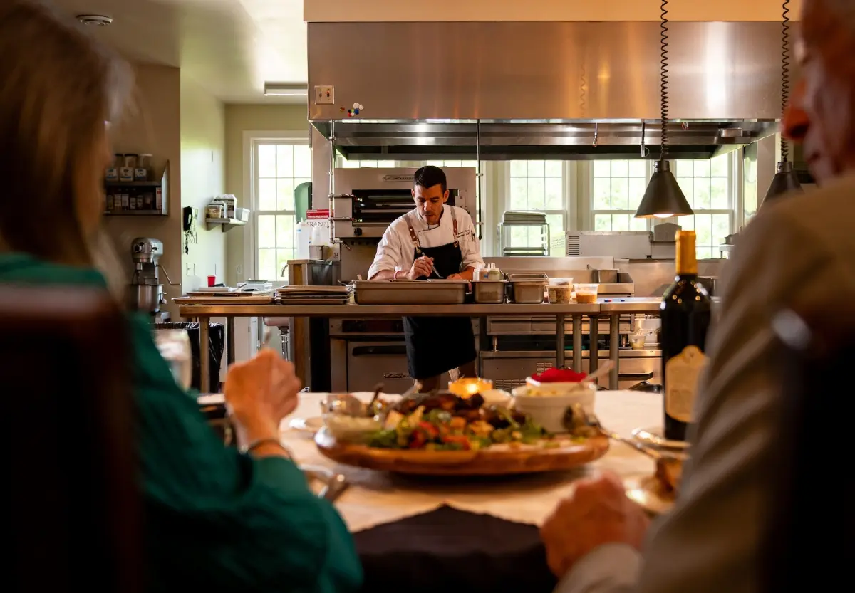 https://edgeofgalena.com/images/carousel/goldmoor-inn-guests-watching-chef-prepare-a-meal.jpg